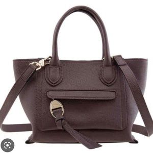 Longchamp mailbox NWOT. Aubergine, comes with dust bag